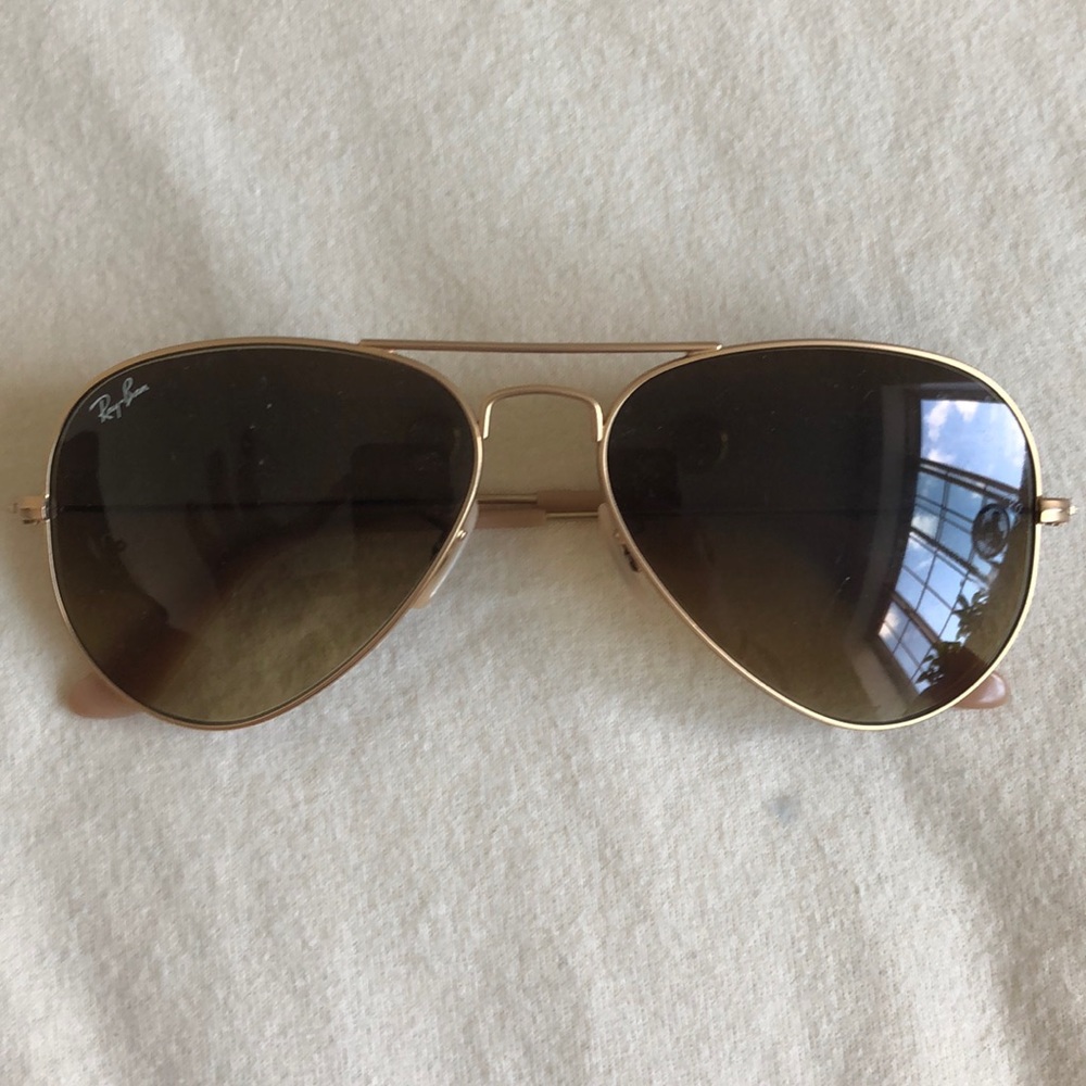 Small brown Raybans.
